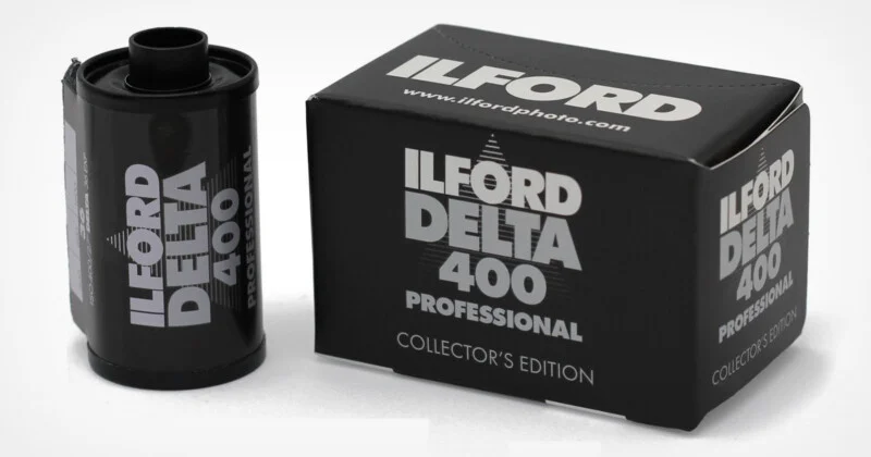 Касета та коробка 35-мм плівки з написом Ilford Delta 400 Professional Collector's Edition на білій поверхні.