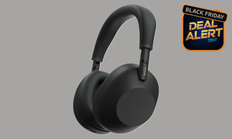 Black Sony WH-1000XM6 wireless headphones against a gray Amazon Black Friday background